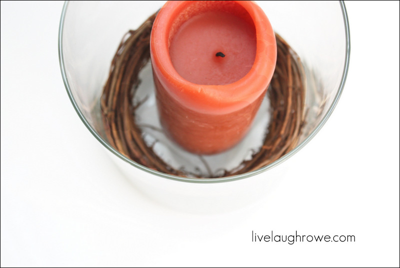 place candle on top of the tealight  candle holder