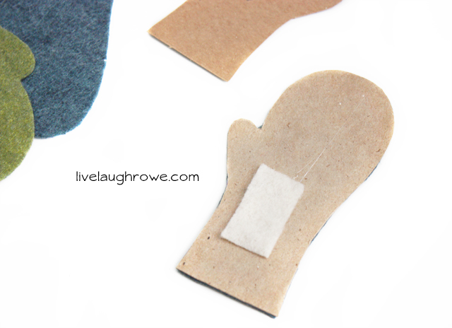 placing felt on back of felt mitten for stringing